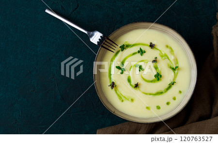 Mashed potatoes, with green butter, micro greenery, homemade, on a dark background, no people, top view, Mashed potatoes, with green butter, micro greenery, homemade, on a dark background, no people, top view, 120763527