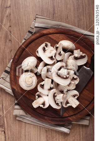 fresh mushrooms, chopped, in a wooden bowl, whole, top view, no people, fresh mushrooms, chopped, in a wooden bowl, whole, top view, no people, 120763540