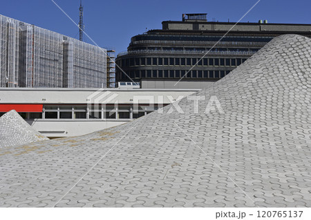 a modern architectural scene, emphasizing a unique, undulating rooftop pattern made of interlocking tiles a modern architectural scene, emphasizing a unique, undulating rooftop pattern made of interlocking tiles 120765137