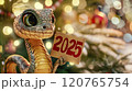 Banner with cute snake close up with table for text and bokeh background in cartoon style. Symbol of New Year 2025 120765754