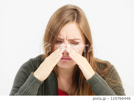 Young woman with painful sinus ache 120766446