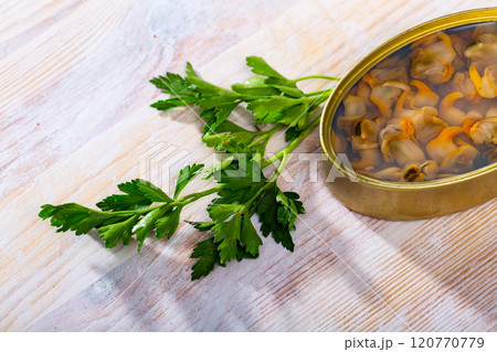 Canned natural molluscs with parsley Canned natural molluscs with parsley 120770779