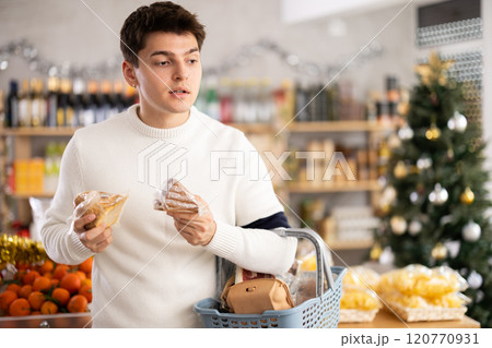 Man chooses cheese Man chooses cheese 120770931