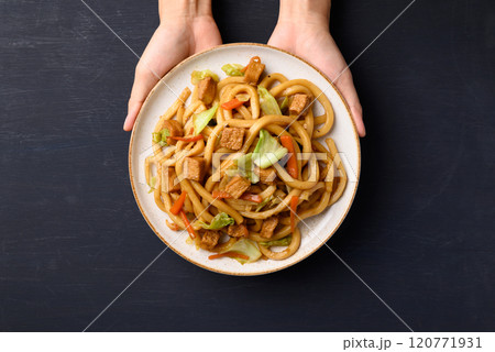 Yaki Udon, Stir fried udon noodles with tofu, carrot, cabbage and mushroom Yaki Udon, Stir fried udon noodles with tofu, carrot, cabbage and mushroom 120771931