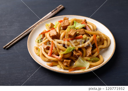 Yaki Udon, Stir fried udon noodles with tofu, carrot, cabbage and mushroom 120771932