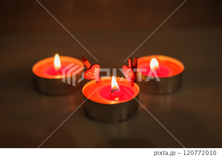 Romantic night with candlelight and bokeh background.New year or romantic valentine Day Romantic night with candlelight and bokeh background.New year or romantic valentine Day 120772010