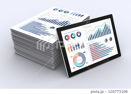 タブレット端末と山積みされたビジネス資料、事業戦略の構築やデータ分析のイメージ 120773106