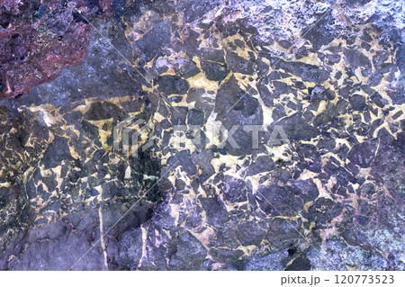 Abstract geometric pattern on rock surface with natural texture and color Abstract geometric pattern on rock surface with natural texture and color 120773523