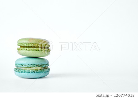 Stack of two colorful French Macarons, macaroons cakes with different flavors Stack of two colorful French Macarons, macaroons cakes with different flavors 120774018