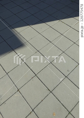 Perspective View of Monotone Gray Brick Stone on The Ground for Street Road. Sidewalk, Driveway, Pavers, Pavement 120775478