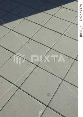 Perspective View of Monotone Gray Brick Stone on The Ground for Street Road. Sidewalk, Driveway, Pavers, Pavement 120775479