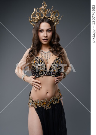 Elegant dancer in ornate costume showcasing traditional art and culture 120776682