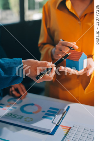 ESG environmental social governance display on laptop on eco-friendly company meeting with business people implementing environmental protection for clean and sustainable future ecology. Trailblazing 120777286