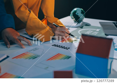 ESG environmental social governance display on laptop on eco-friendly company meeting with business people implementing environmental protection for clean and sustainable future ecology. Trailblazing 120777289