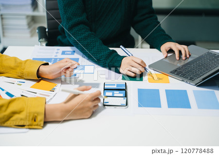 UX graphic designer planning application process development prototype wireframe for web smart phone. 120778488