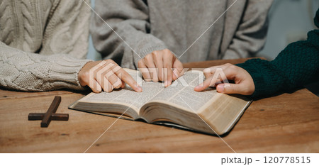 Christians are congregants join hands to pray and seek the blessings of God. Christians are congregants join hands to pray and seek the blessings of God. 120778515