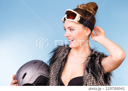Woman wearing sexy winter sport outfit 120780042