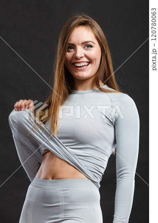 Fit woman in thermolinen underwear, 120780063