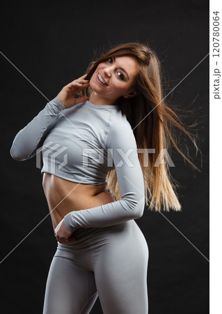 Sporty woman wearing thermoactive underwear. 120780064