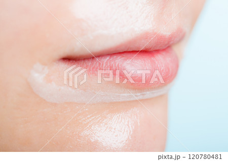 Close up woman in facial peel off mask. 120780481