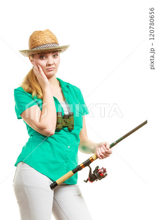 Woman with fishing rod, spinning equipment Woman with fishing rod, spinning equipment 120780656
