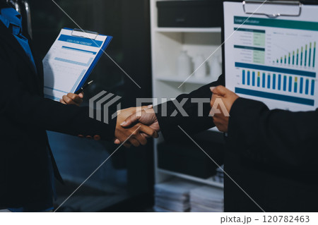 Female hands shaking at group meeting making partnership deal, businesswoman welcoming new partner with handshake as concept of collaboration gratitude respect, women power in business, close up view 120782463
