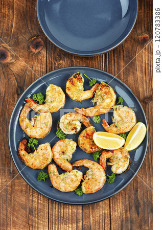 Herb-marinated giant prawns. Herb-marinated giant prawns. 120783386