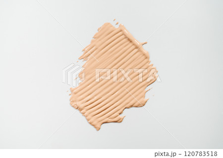 Big foundation smear on white background. Design element for cosmetic banner holiday sale Big foundation smear on white background. Design element for cosmetic banner holiday sale 120783518