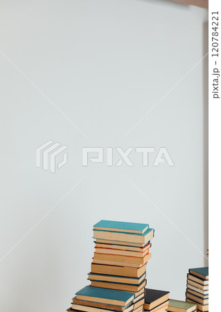 Stacks of books for reading and education in the college library on a white background 120784221