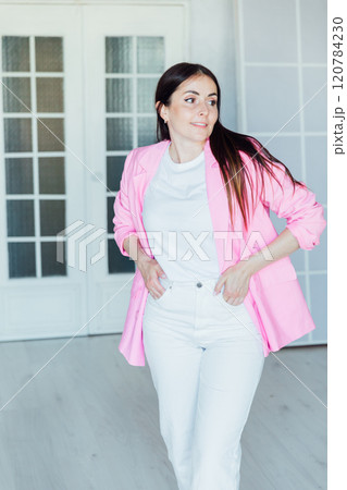 Beautiful Fashion Brunette Woman in Pink Jacket and White Clothes Beautiful Fashion Brunette Woman in Pink Jacket and White Clothes 120784230