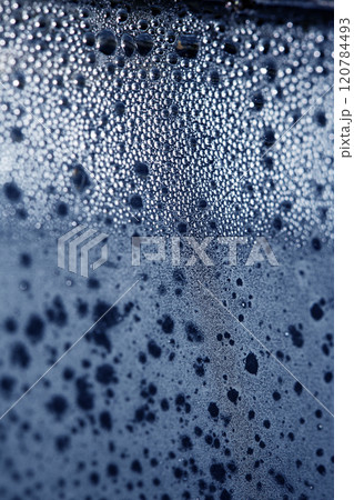 CLose Up of Condensation Bubbles and Marks on A Window Water Background CLose Up of Condensation Bubbles and Marks on A Window Water Background 120784493