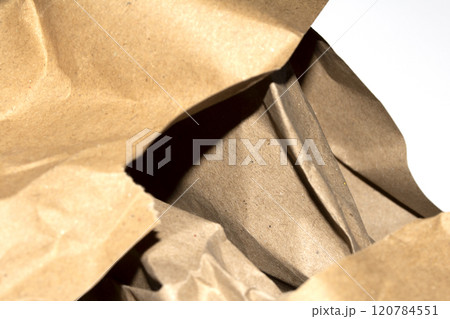 Ripped Up Torn Cardboard Box Packaging with Ridges on White Background Ripped Up Torn Cardboard Box Packaging with Ridges on White Background 120784551