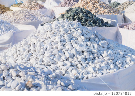 Dolomite mineral stones are sold in construction market. White materials for decoration and construction. Dolomite mineral stones are sold in construction market. White materials for decoration and construction. 120784813