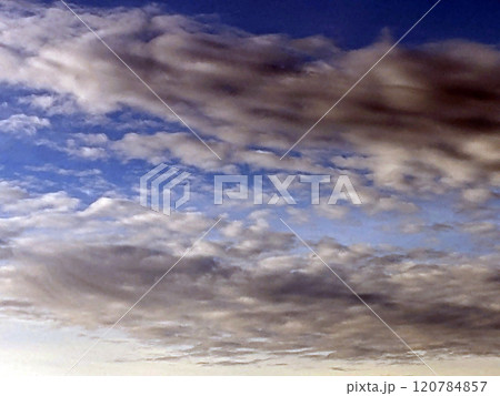 Big White Fluffy Clouds on A Blue Sky With Fine Whispy Lines 120784857