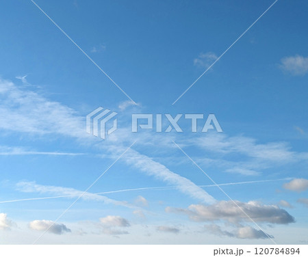 Cloudscape Fluffy White Clouds and Blue Sky for Background Cloudscape Fluffy White Clouds and Blue Sky for Background 120784894