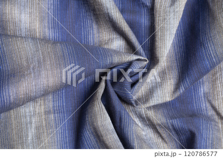 Gray blue fabric cloth texture with spiral folds 120786577