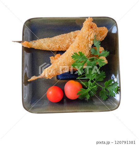 Shishamo fried, deep fried fish capelin in dish on white. Shishamo fried, deep fried fish capelin in dish on white. 120791381