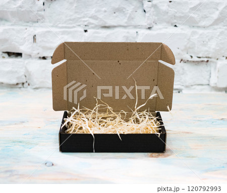 cardboard box on a table cardboard box on a table 120792993