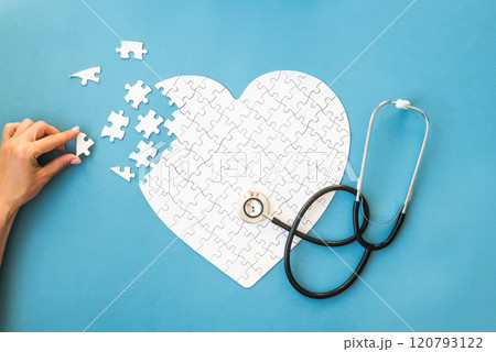 White puzzle in heart shape White puzzle in heart shape 120793122