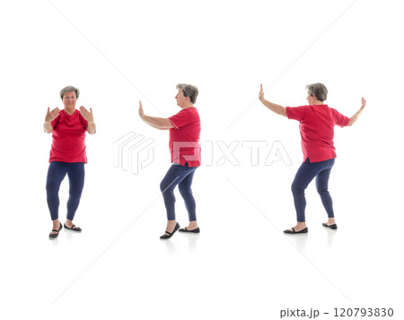 Tai chi forms performed by older woman 120793830