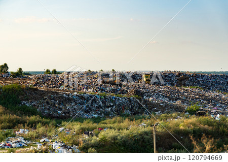 Garbage landfill. A large pile of garbage at the landfill. Municipal garbage landfill Garbage landfill. A large pile of garbage at the landfill. Municipal garbage landfill 120794669