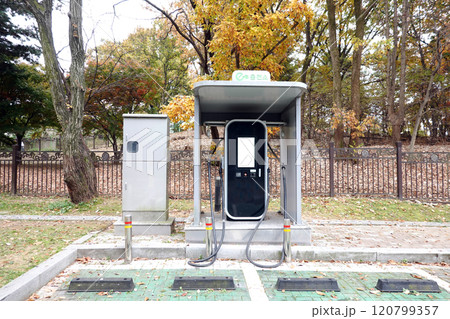 Electric vehicle charging station, Modern fast electric vehicle chargers for charging car in park Electric vehicle charging station, Modern fast electric vehicle chargers for charging car in park 120799357