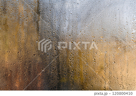 Water drops on wet glass Water drops on wet glass 120800410