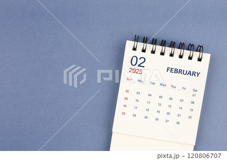 February 2025 Mini monthly desk calendar for 2025 year on blue color background. 120806707