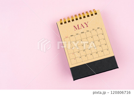 May 2025 desk calendar on pink color background, Position with copy space. May 2025 desk calendar on pink color background, Position with copy space. 120806716