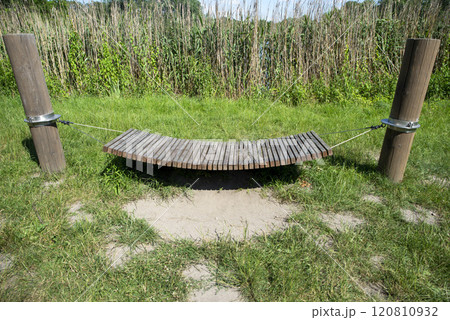 Relaxation Spot in Nature with Wooden Hammock Relaxation Spot in Nature with Wooden Hammock 120810932