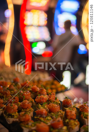 catering buffet table with snacks and appetizers. Set of canapes with jamon, bruschetta, pear and cheese 120811146