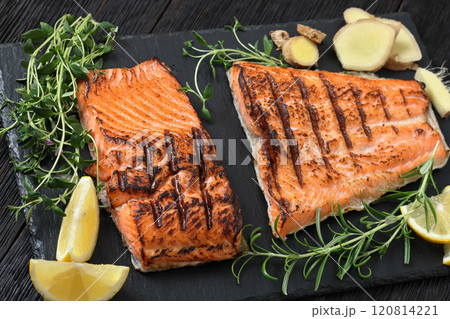 grilled salmon fish fillet with herbs, top view 120814221