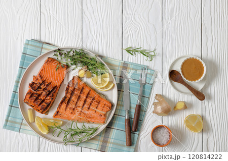 grilled salmon fish fillet with herbs, top view grilled salmon fish fillet with herbs, top view 120814222