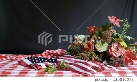 Patriotic Still Life with American Flag and Floral Arrangement 120816078